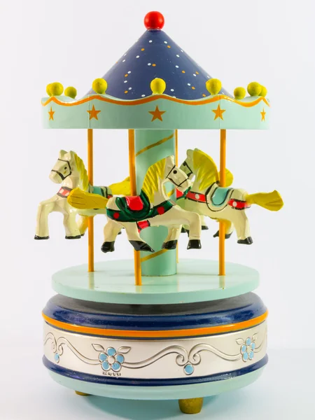 Nebesky modré merry-go-round koně zvonkohra — Stock fotografie