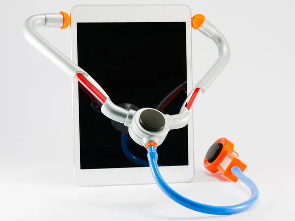 Digitale tablet pc met speelgoed stethoscoop — Stockfoto