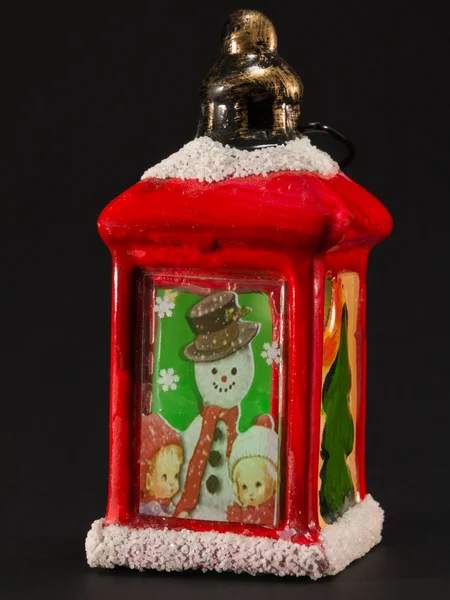 Red christmas lantern with snowman and children decoration — Stock Photo, Image