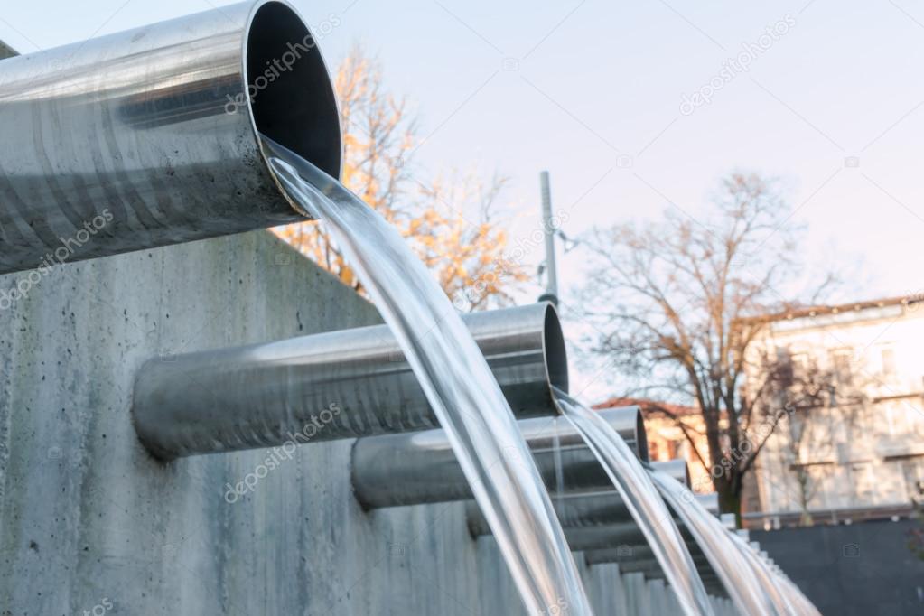 Water flowing out from steel pipes
