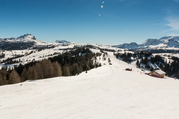 Sunny Ski Slope at ski resort with glare — Stock Photo, Image