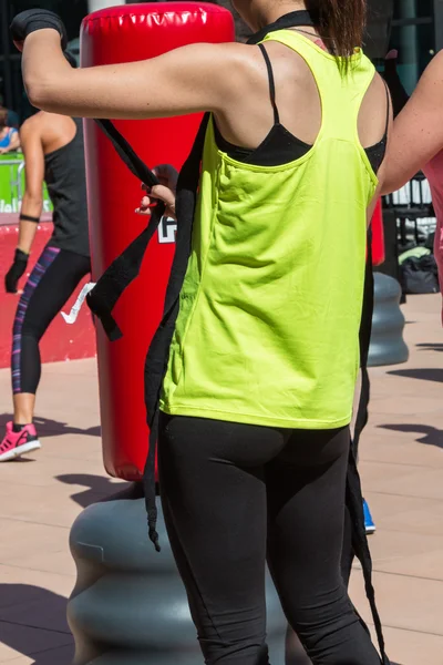 Girl Wearing Hands Strip for Fitness with Punching Bag — Stok Foto