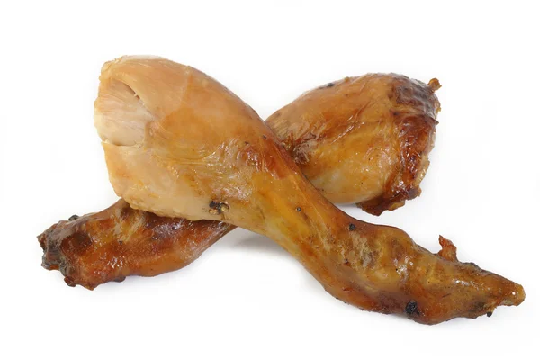 Bastón de pollo al horno sobre fondo blanco — Foto de Stock