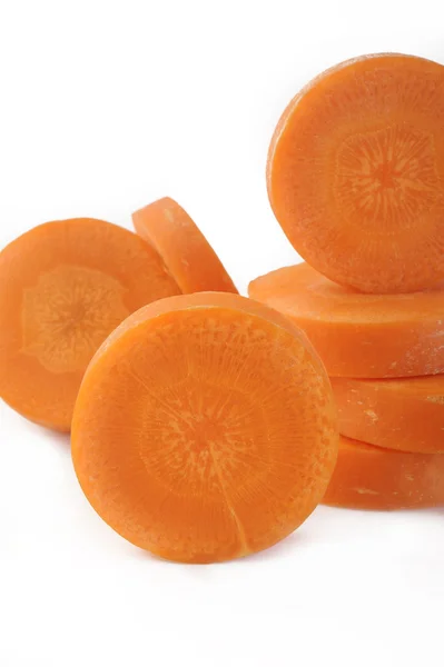 Fresh sliced carrots on white background — Stock Photo, Image