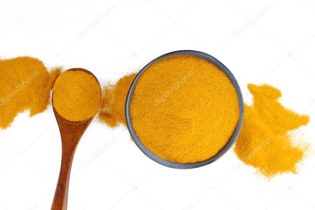 turmeric powder on white background