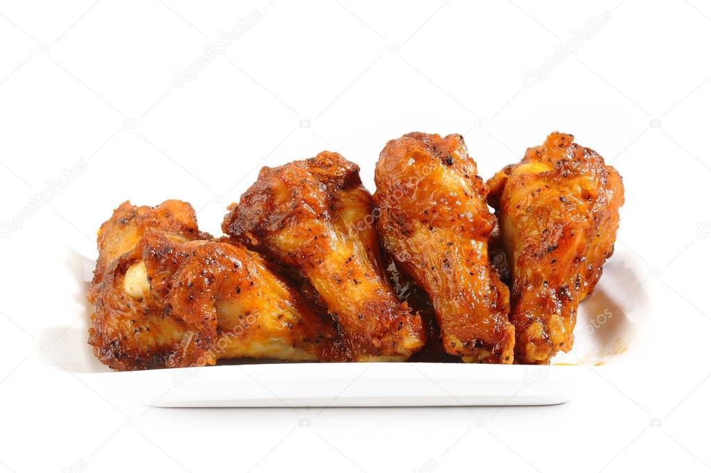 chicken wings on a white plate