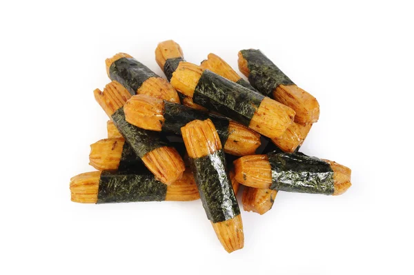 Seaweed wrapped rice crackers on white background — Stock Photo, Image