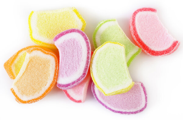 colorful candied fruit jelly on white background