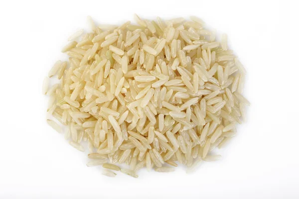 Brown rice on white background — Stock Photo, Image