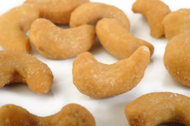 Arka plan üzerinde tuzlu kaju fıstığı