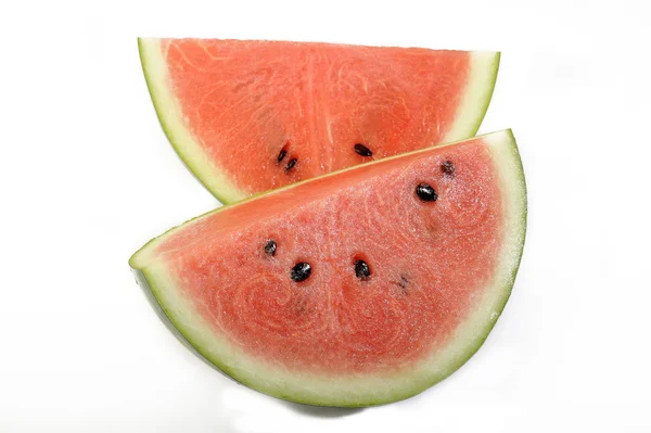 Skivad vattenmelon isolerad på vit bakgrund — Stockfoto
