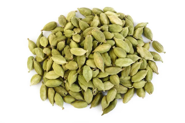 Cialde di cardamomo su sfondo bianco — Foto Stock