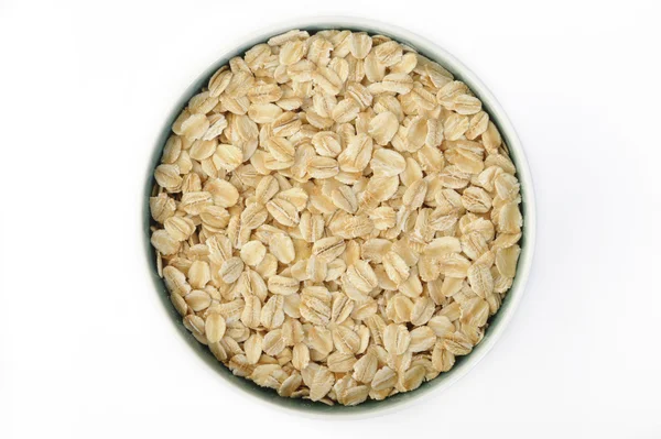 Oats in bowl — Stock Photo, Image