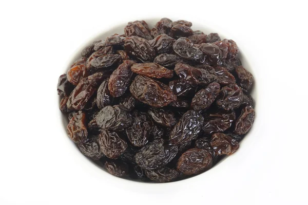 Bowl of raisin on white — Stock Photo, Image