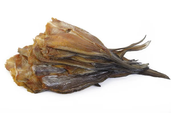 Pesce salato essiccato su fondo bianco — Foto Stock