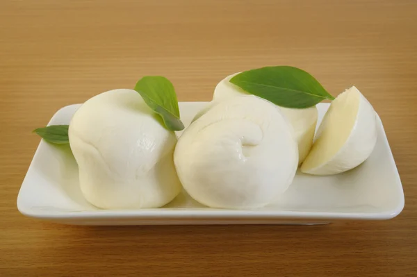 Fresh mozzarella cheese with basil — Stock Photo, Image