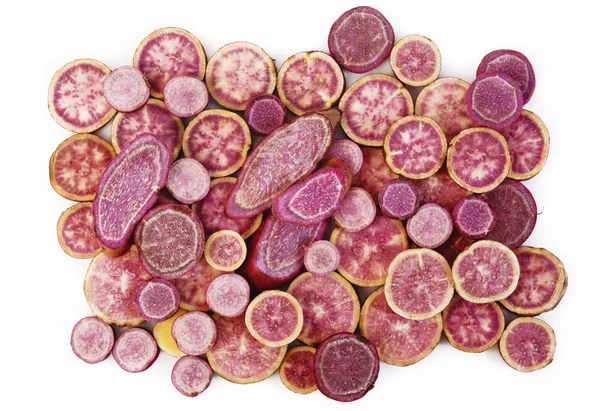 Purple batatas en blanco —  Fotos de Stock