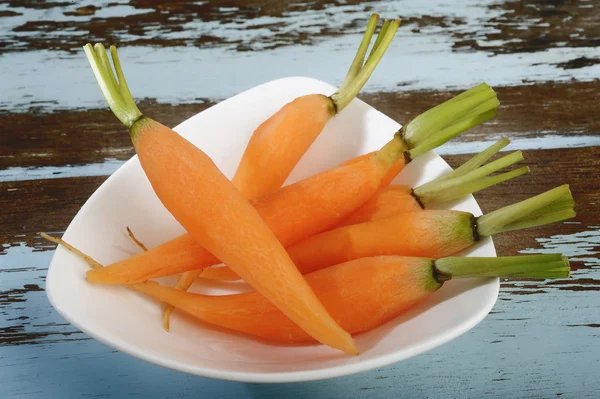 Fresh peeled baby carrots for cooking — Stock Photo, Image