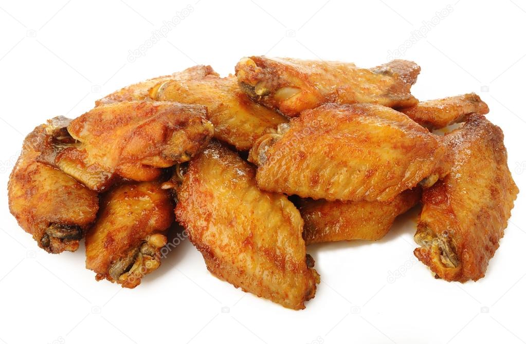 Grilled chicken wings on white background