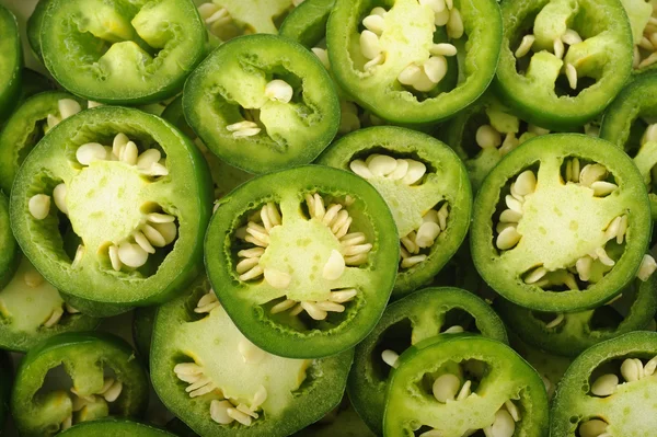 Sliced green jalapeno peppers — Stock Photo, Image