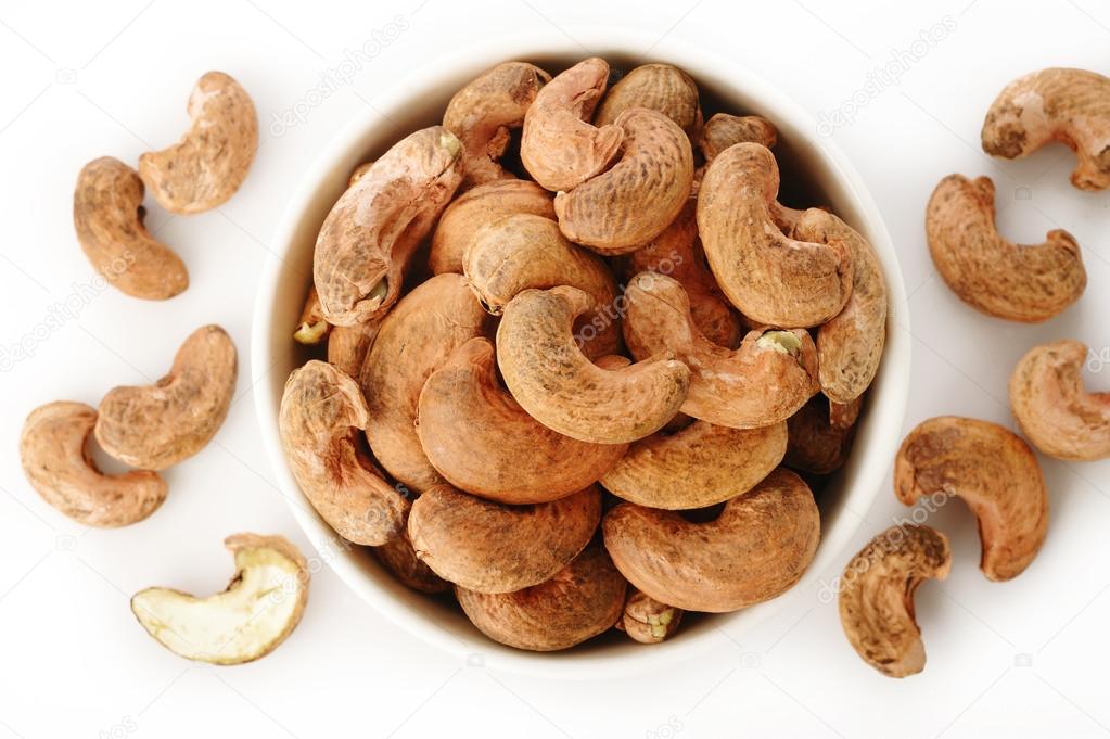 Cashew nuts burned in white bowl