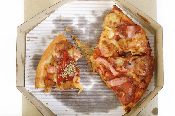 Rebanada de pizza en la caja —  Fotos de Stock