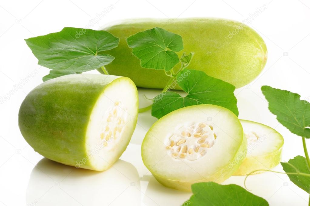 Slices of wax gourd on white
