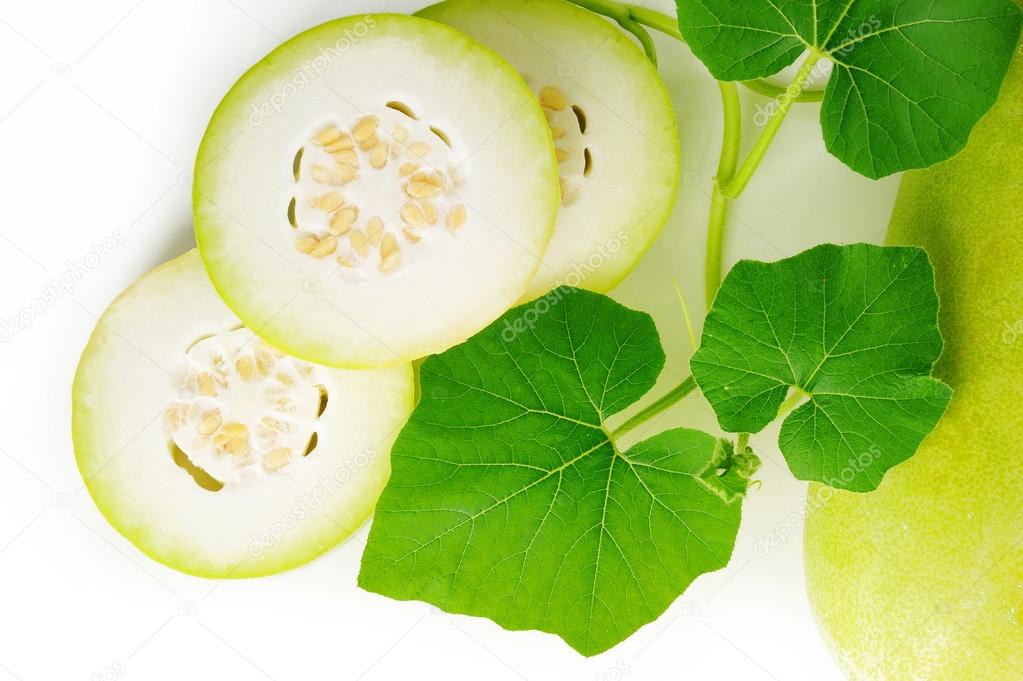 Slices of wax gourd on white background