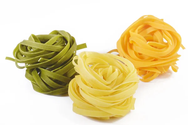 Fettuccine pasta on white background — Stock Photo, Image