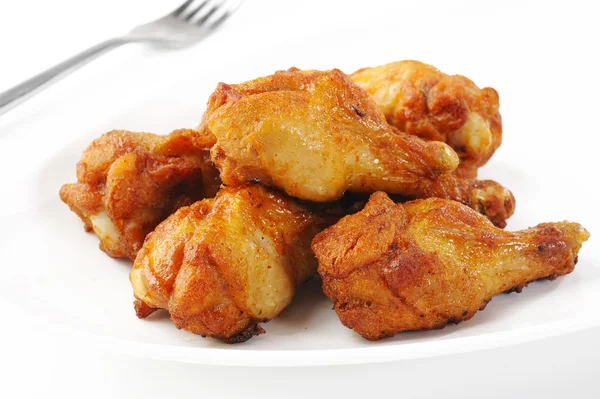 Alitas de pollo en plato — Foto de Stock