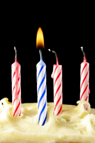 Birthday candles on cake — Stock Photo, Image