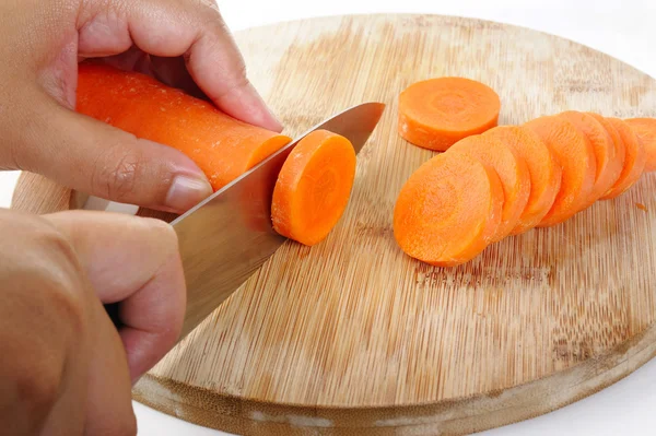 Slice carrot on wood — Stock Photo, Image