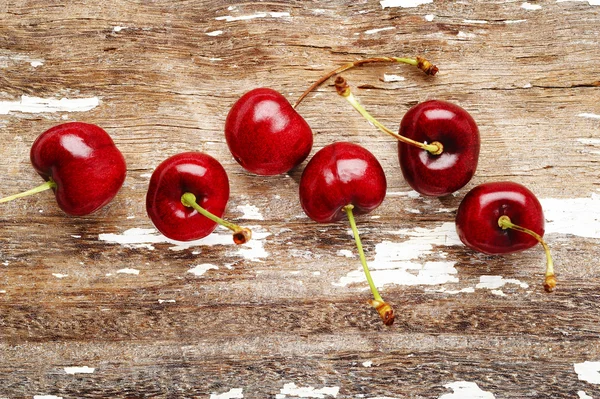 Cherry on wood — Stock Photo, Image