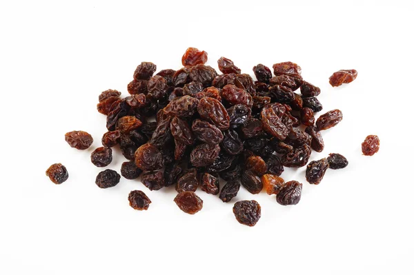 Pile de raisins secs sur fond blanc — Photo