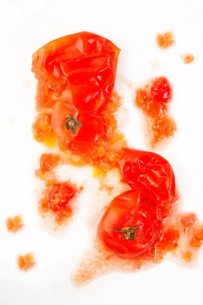 Splattered tomato on white background — Stock Photo, Image