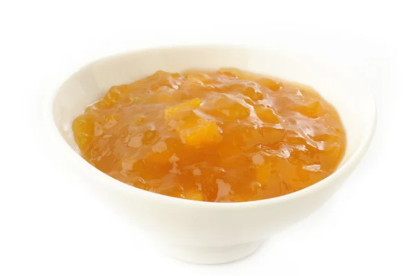 Selai persik dalam mangkuk putih — Stok Foto