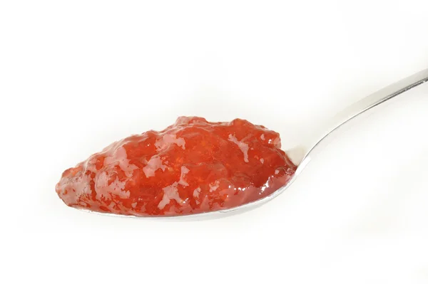 Strawberry jam in spoon — Stock Photo, Image