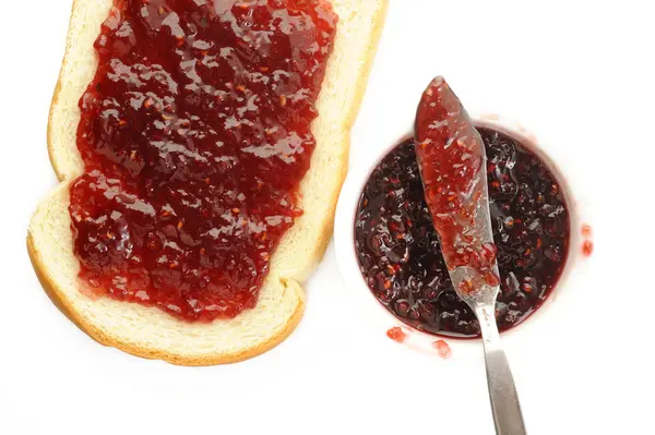 Raspberry jam and toast — Stock Photo, Image