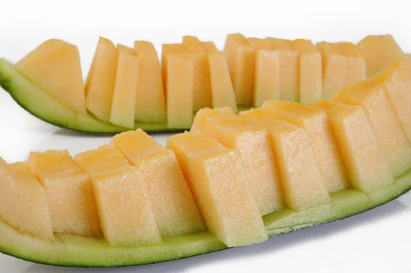 Potongan melon di latar belakang putih — Stok Foto