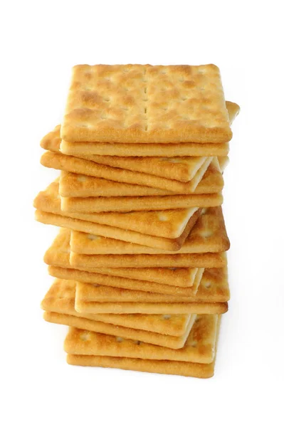 Cracker salati su bianco — Foto Stock