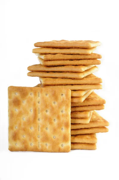 Cracker salati su sfondo bianco — Foto Stock