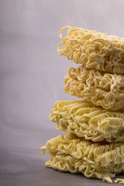 dried instant noodles, isolated on gray background