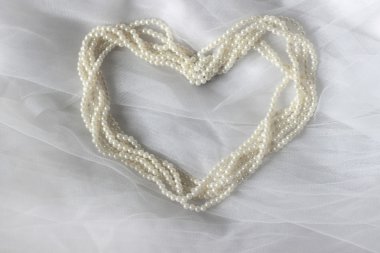 Kalpli çerçeve perl boncuklar ile