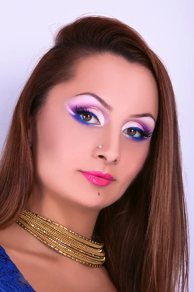 Portrait of a beautiful young girl with professional makeup — Stock Photo, Image