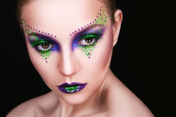 Portrait of a beautiful young girl with professional makeup — Stock Photo, Image