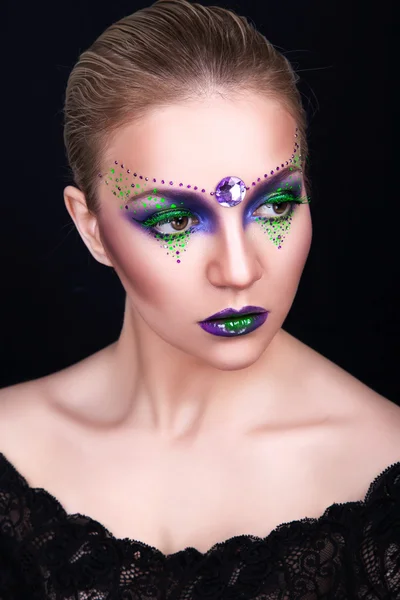 Portrait of a beautiful young girl with professional makeup — Stock Photo, Image