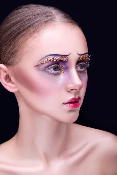 Portrait of a beautiful young girl with professional makeup — Stock Photo, Image