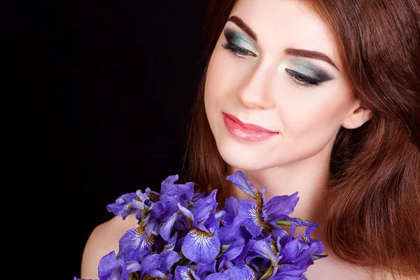 beautiful young girl with a flower in her hair, makeup