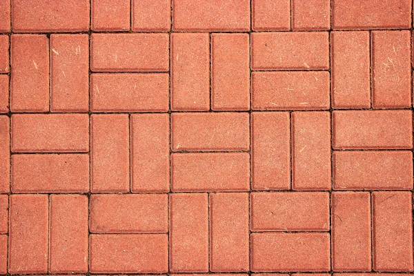 Fondo de la foto de los adoquines de cemento rojo patrón de acera — Foto de Stock