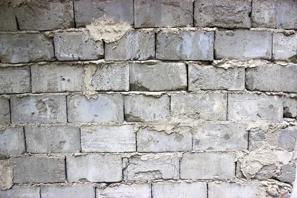 Masonry old foam concrete wall with traces of masonry mortar — Stock Image Masonry old foam concrete wall with traces of masonry mortar Royalty Free Stock Images